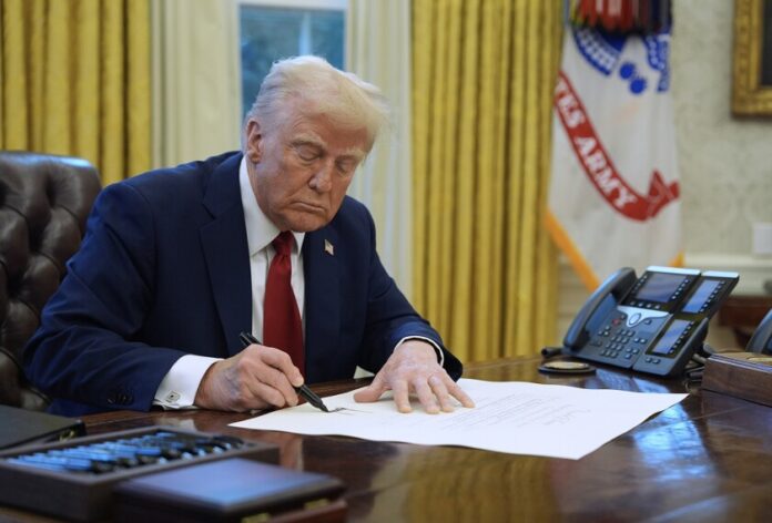 Trump signs