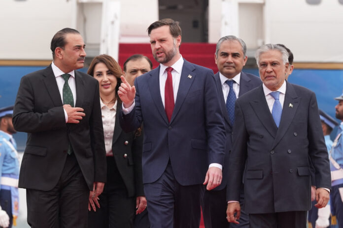 U.S. Vice President JD Vance walks with Pakistan's Chief of Defence Forces and Chief of Army Staff Field Marshal Asim Munir and Pakistani Deputy Prime Minister and Foreign Minister Mohammad Ishaq Dar after arriving for talks with Iranian officials in Islamabad, Pakistan, Saturday, April 11, 2026. Jacquelyn Martin/Pool via REUTERS